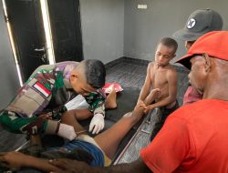Cepat Tanggap, Satgas Yonif 122/TS Bantu Obati Warga yang Terluka